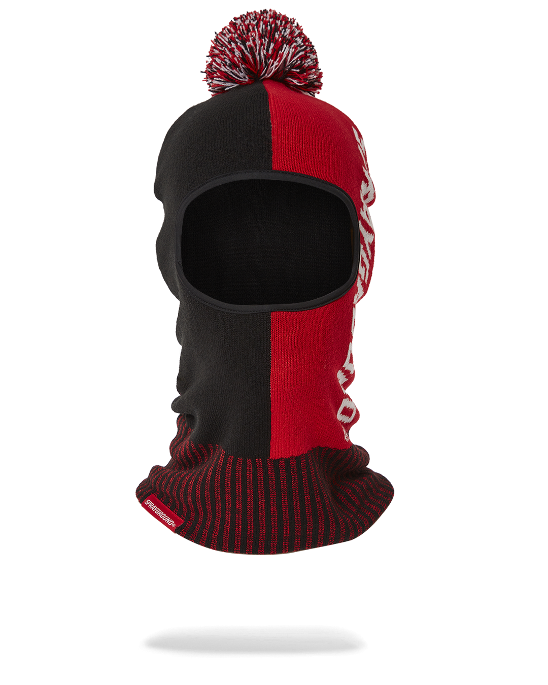 Front view of the knitted pom ski mask, showcasing its stylish design.