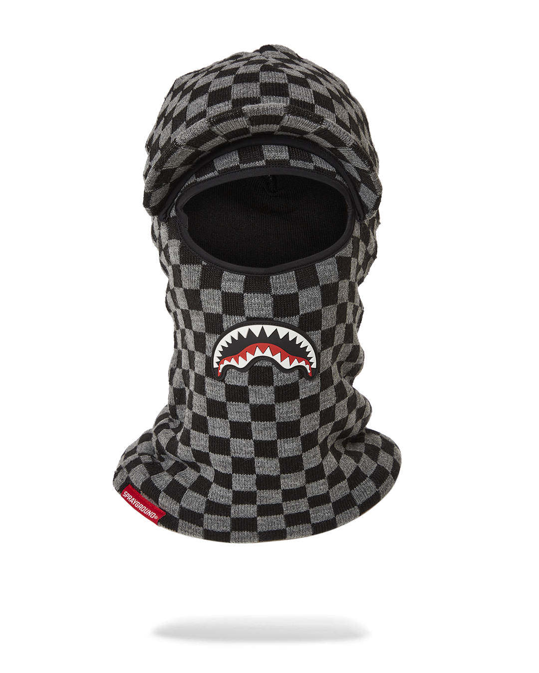 Front view of ski mask showing visor detail on snowy terrain.