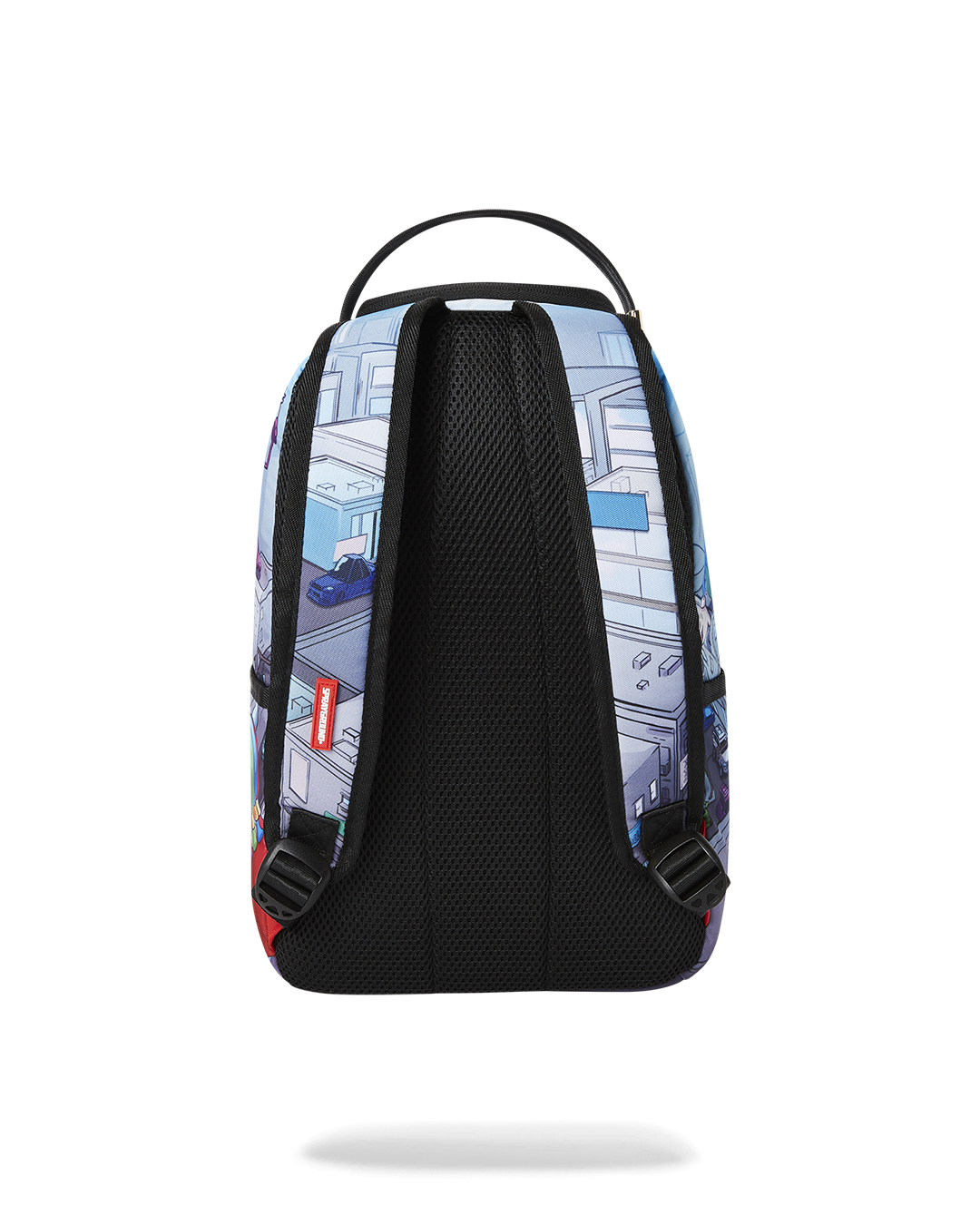 Coach mini backpack worn crossbody at a café, showcasing its compact size