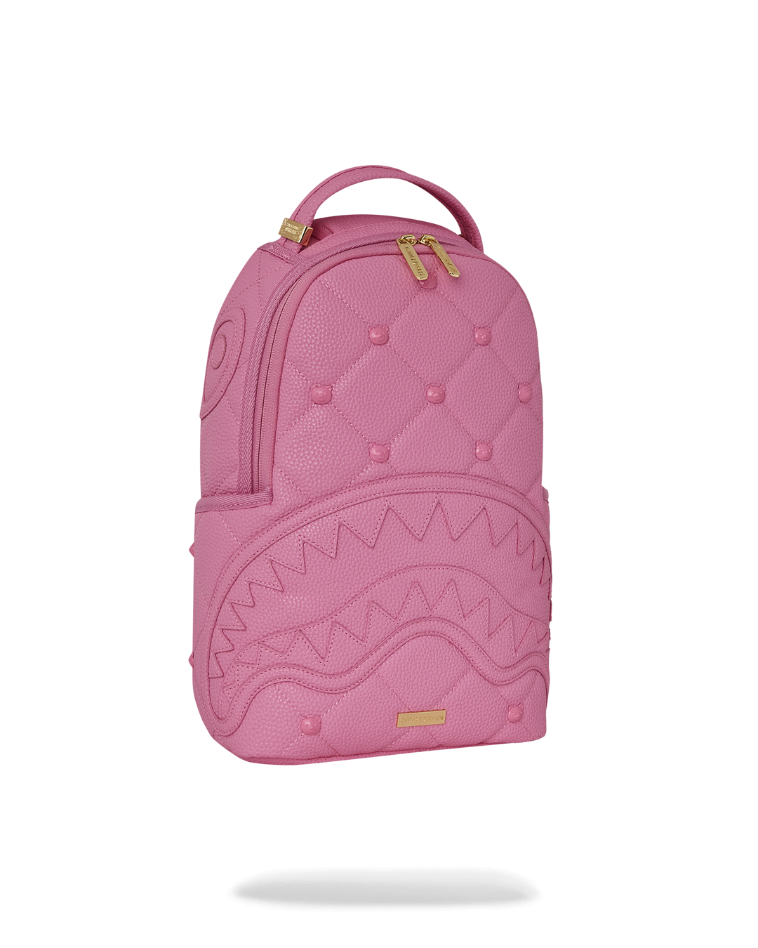 Pink mini backpack with bear face studs, open showing interior large zipper compartment and mesh pocket