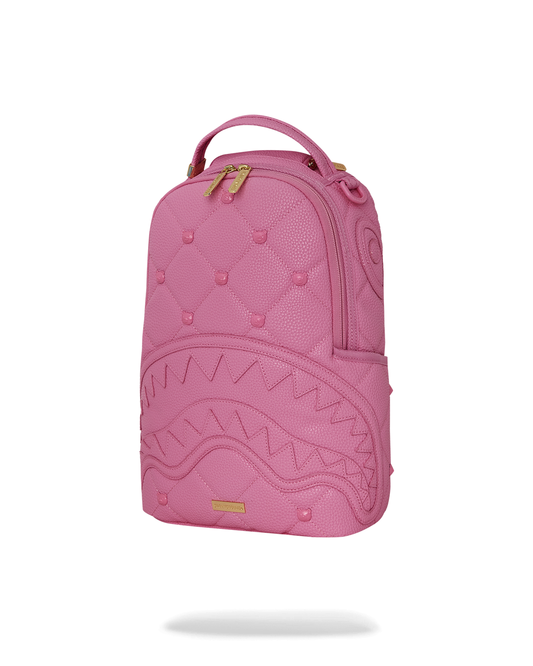 Pink mini backpack with bear face studs, open showing interior large zipper compartment and mesh pocket