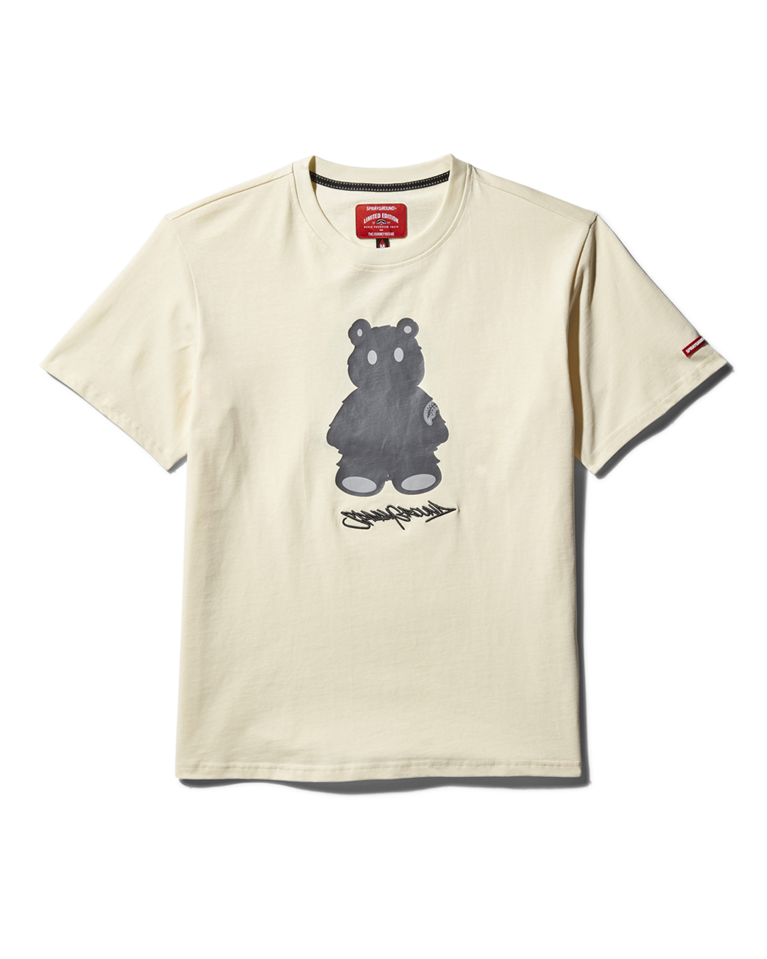 Front view of the apricot cotton graphic t shirt with money bear print on a model