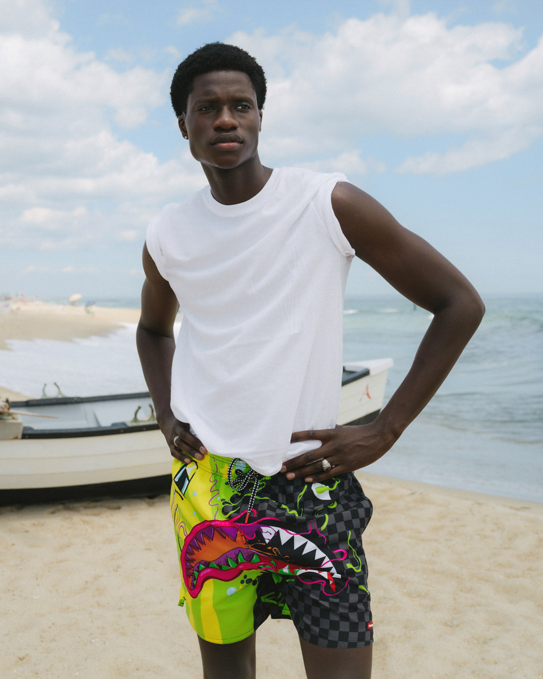 Close-up of quick dry swimming shorts with side pockets detail
