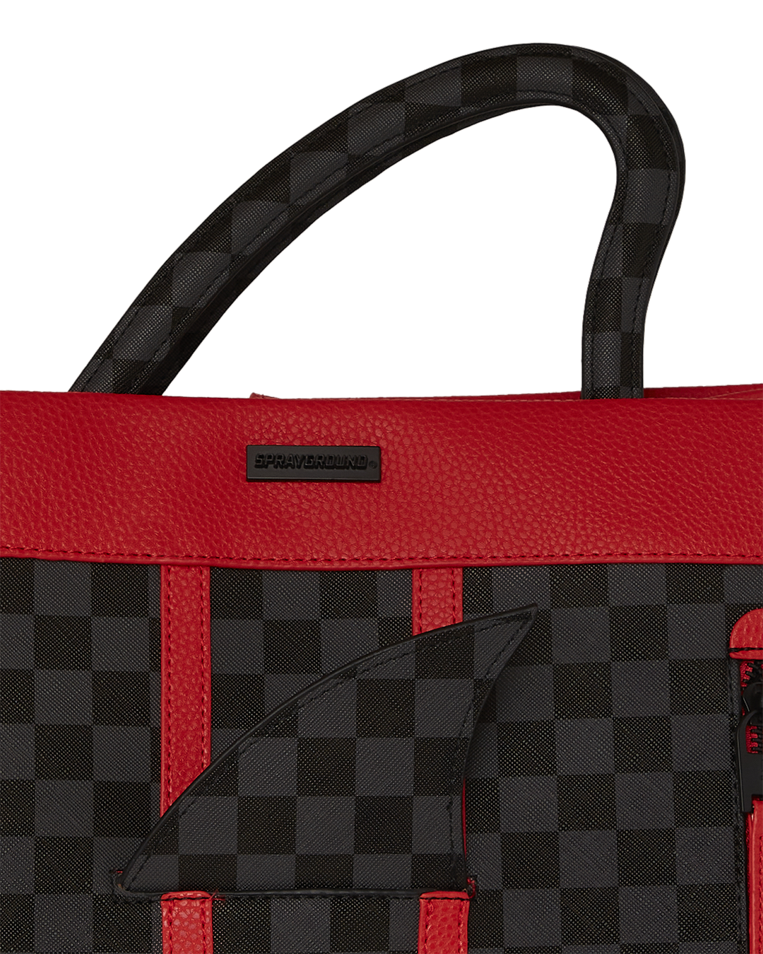Close-up of shark-fin handle and exterior details on the tote