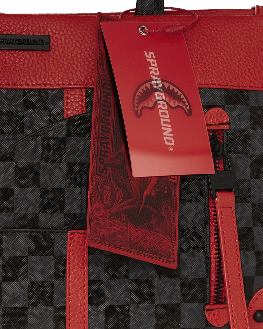 Interior zipper pocket and snap closure of the canvas tote bag