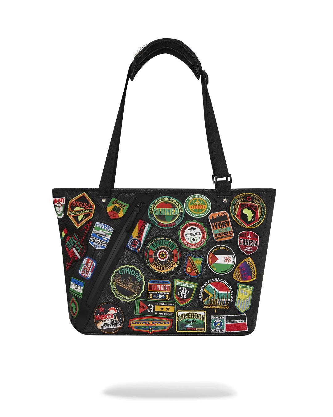Close-up of Sprayground cargo tote bag showing leopard print and patchwork details