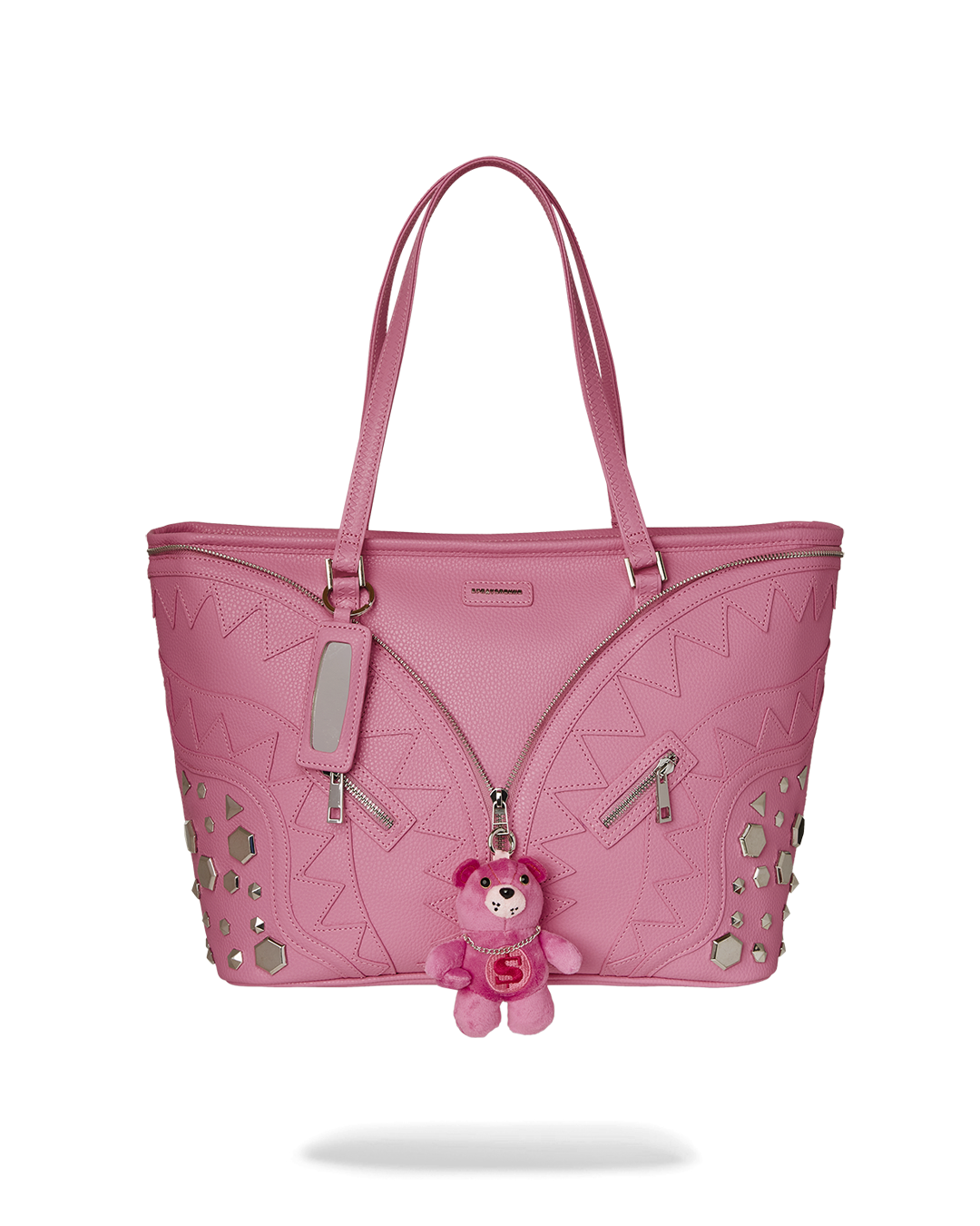Sprayground leopard print tote bag with faux leather construction and decorative zipper details.