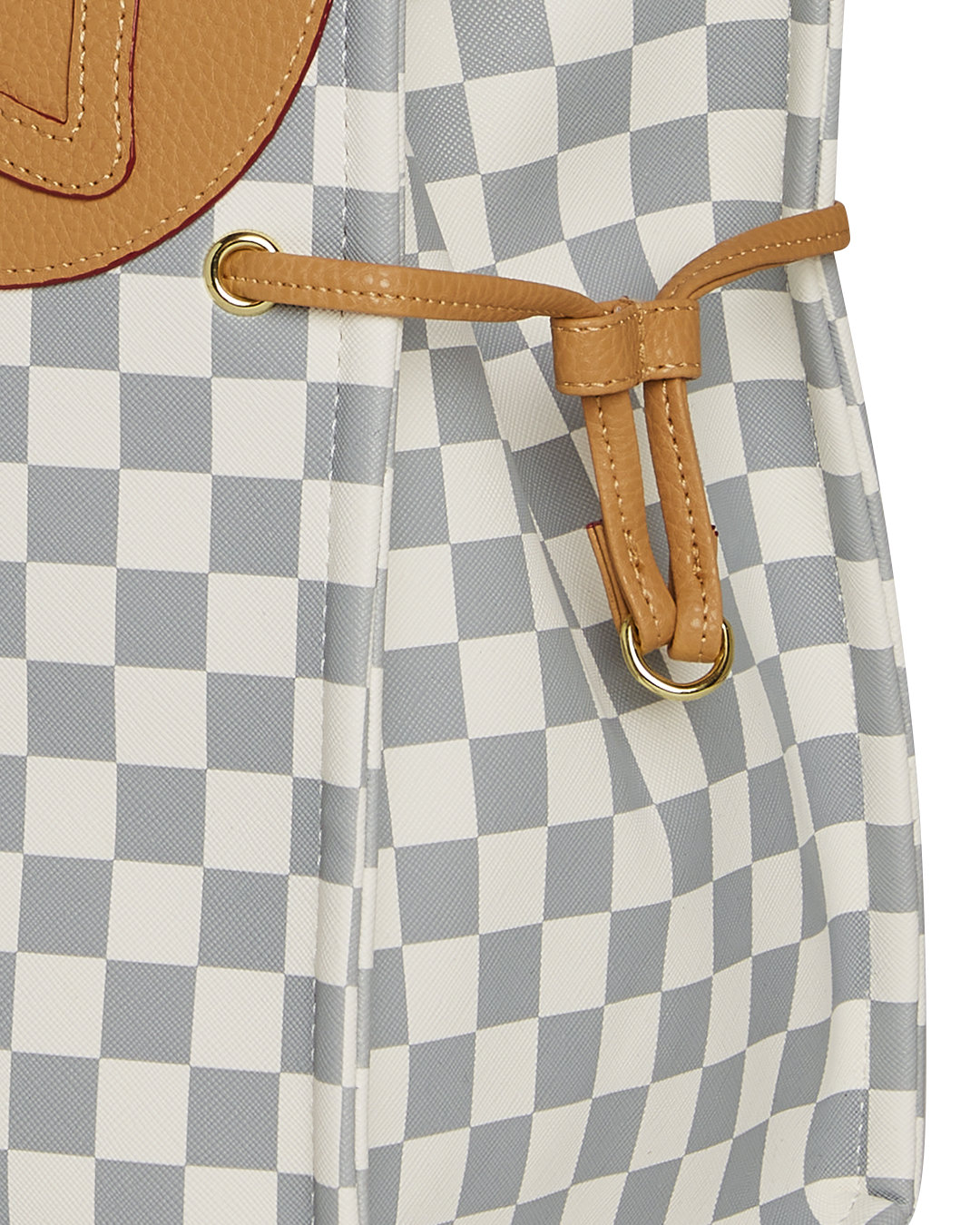 Henny Latte tote bag worn crossbody with laptop inside