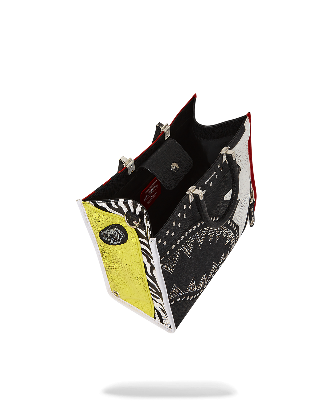 Interior view of the tote bag featuring sections for a laptop and cellphone pocket.