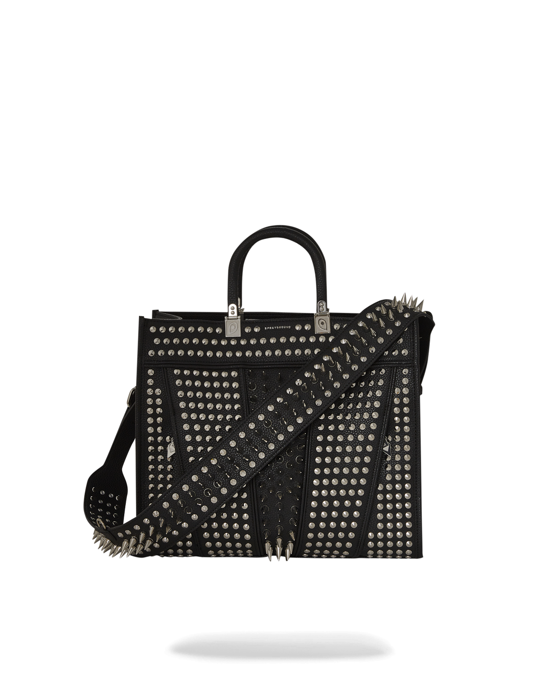 Tortuga Leather Tote Bag with adjustable cross-body strap, being carried by a woman