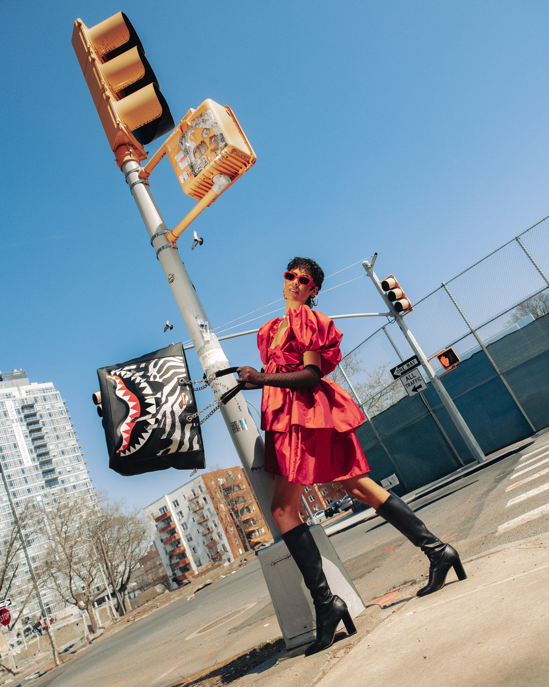 Front view of the Sprayground water-resistant tote bag with metallic design.