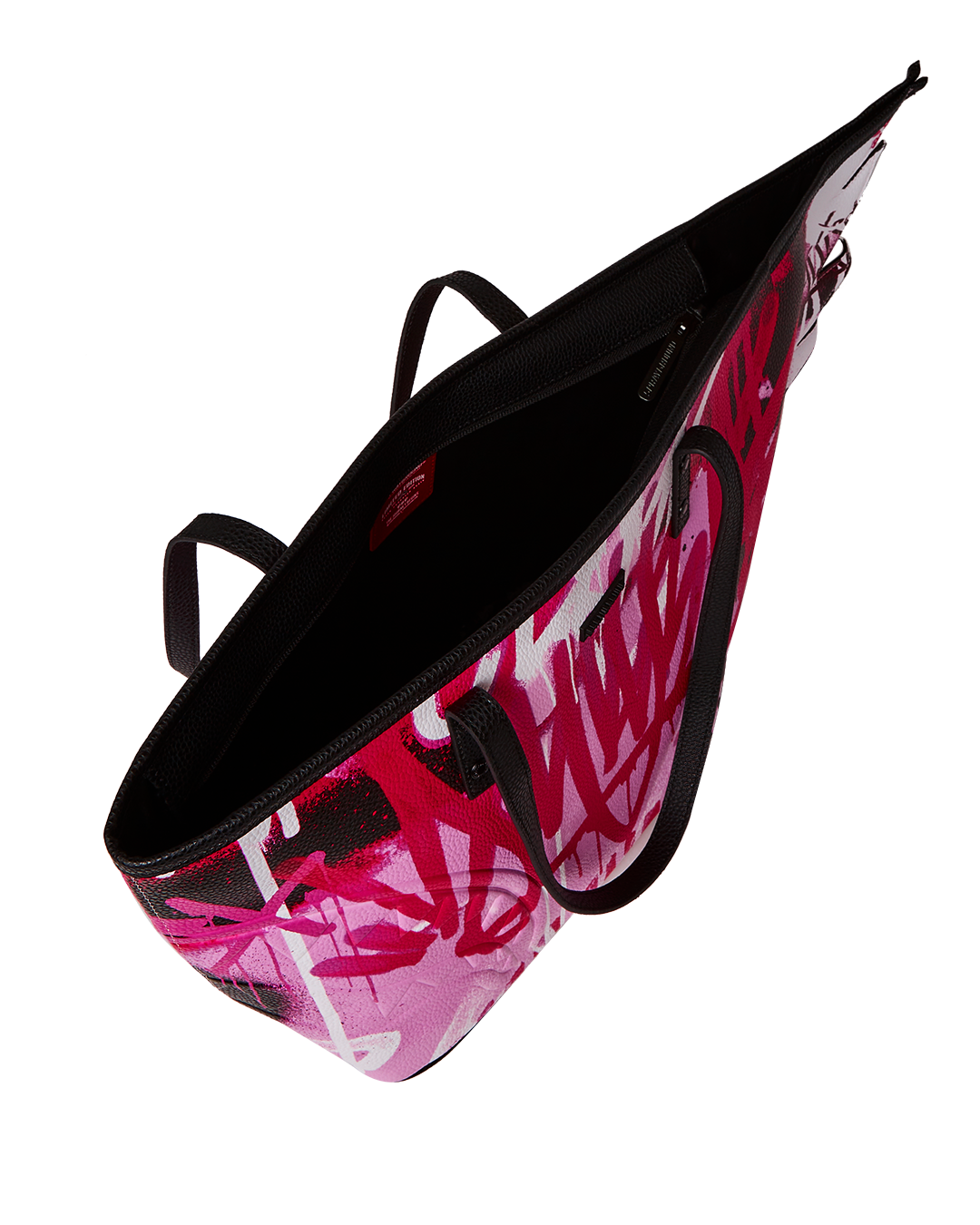 Interior of the SkyGlow faux leather tote bag highlighting organizational pockets.