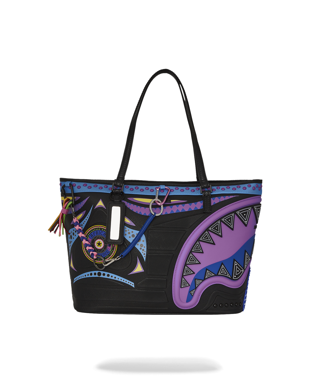 View of the Sprayground tote highlighting water-resistant faux leather and sturdy handles
