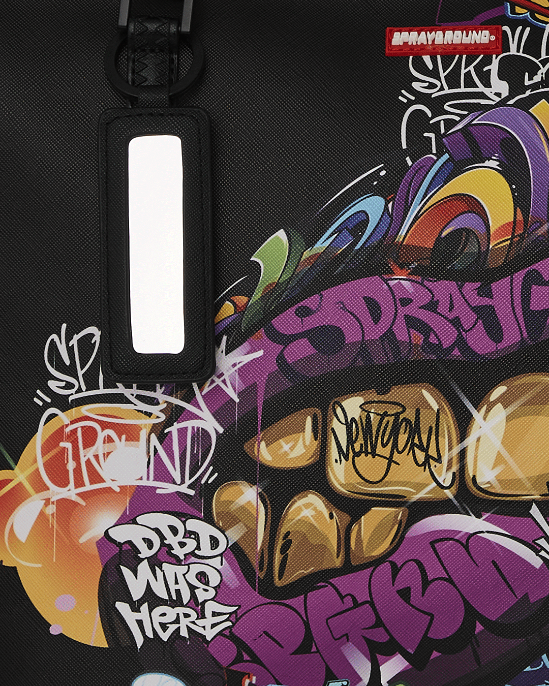 Sprayground tote bag in leopard print, showcased at a city park