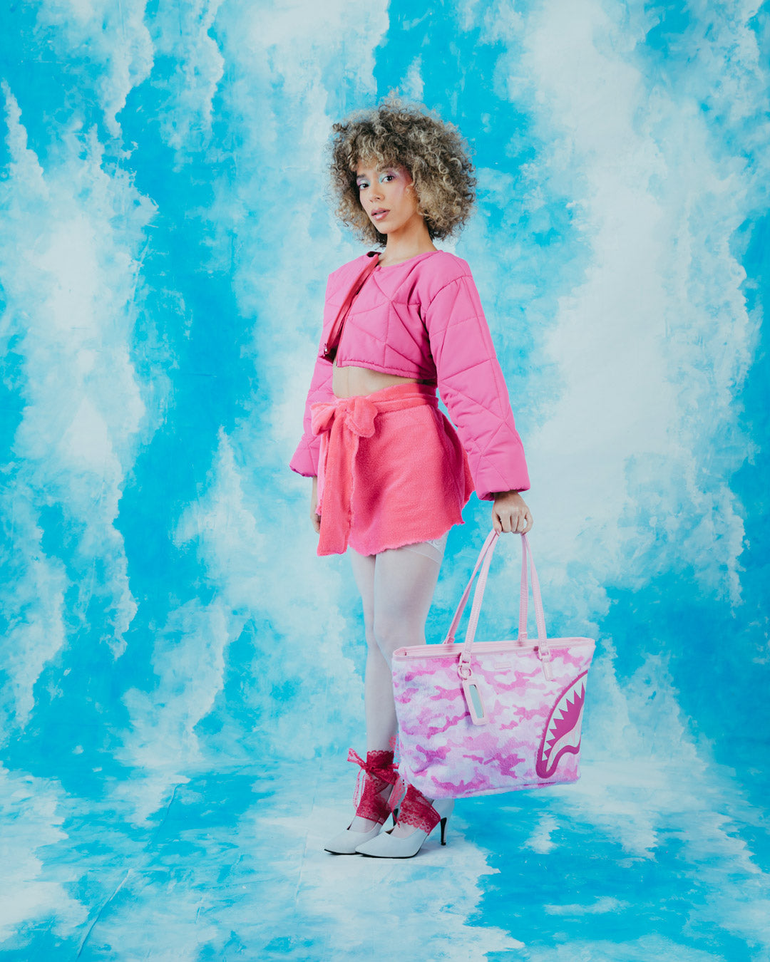 Over the shoulder bag in pink, perfect for daily outings and events.