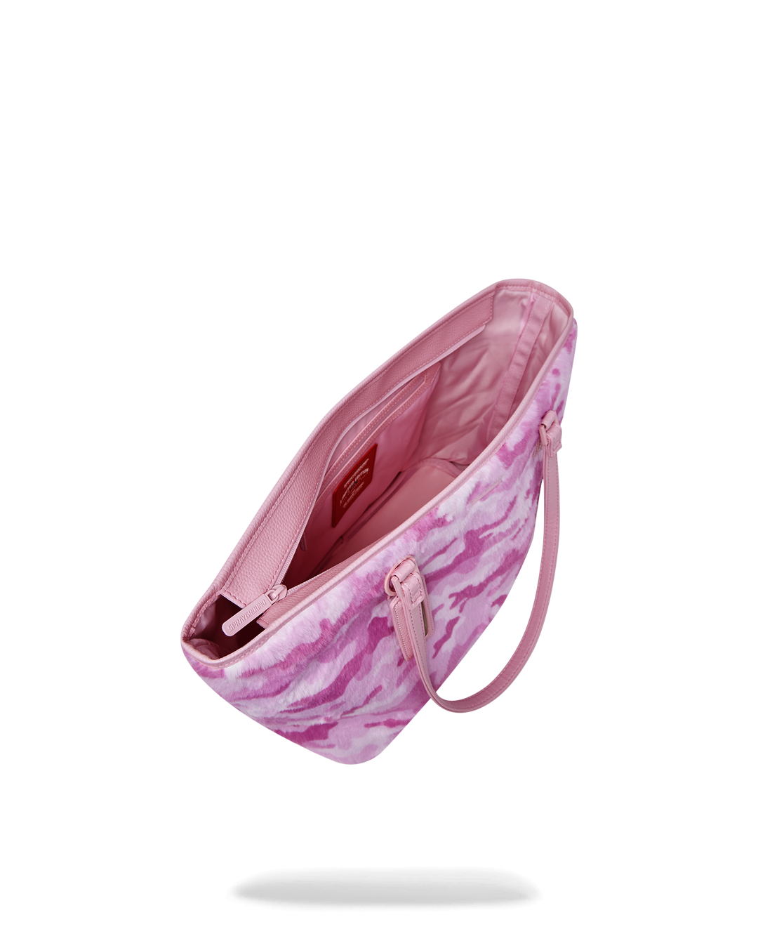 Durable faux leather pink tote, ideal for carrying essentials.