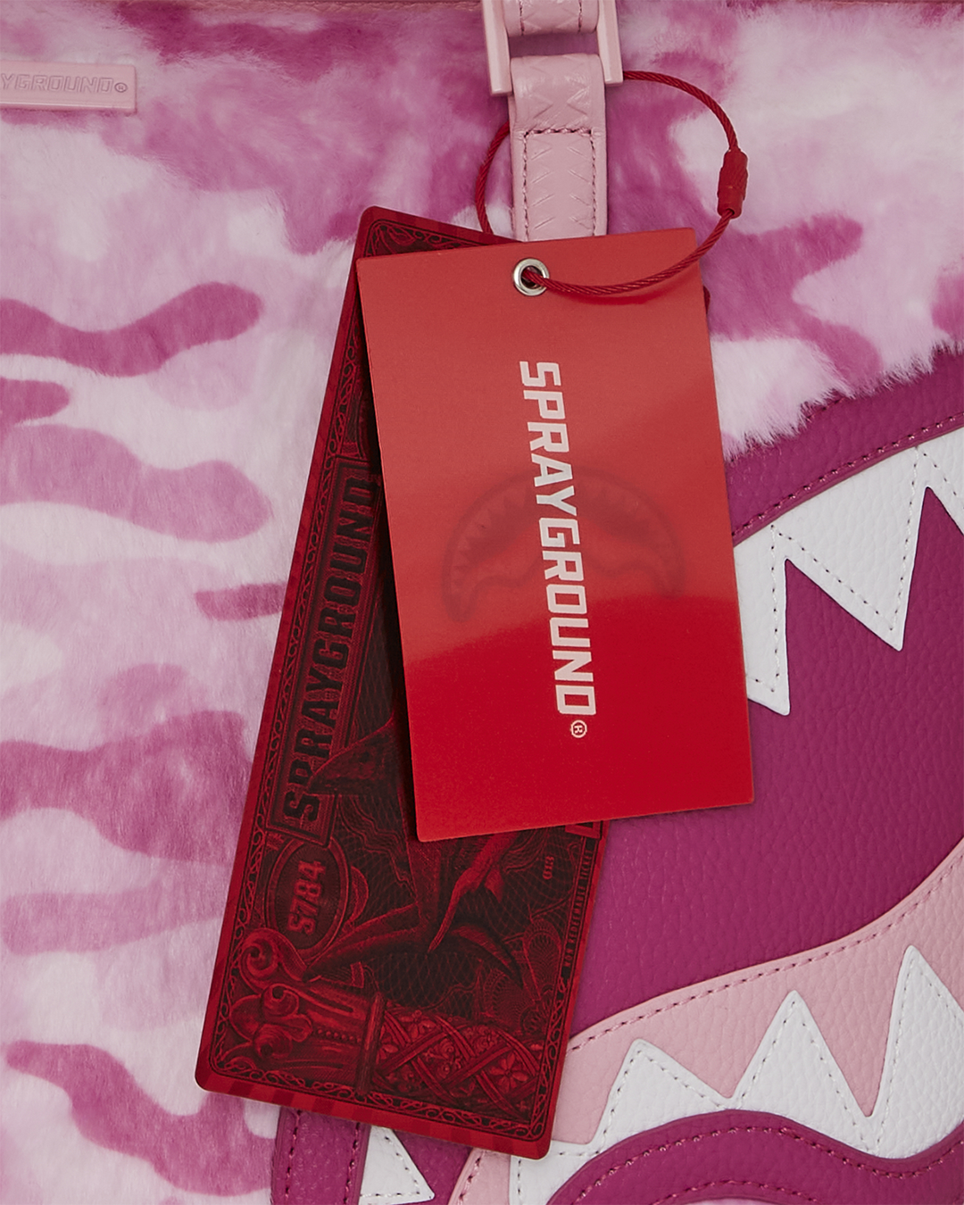 Durable faux leather pink tote, ideal for carrying essentials.