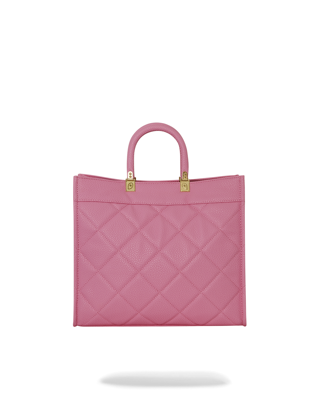 Front view of the pink tote bag with bear face studs and gold accents