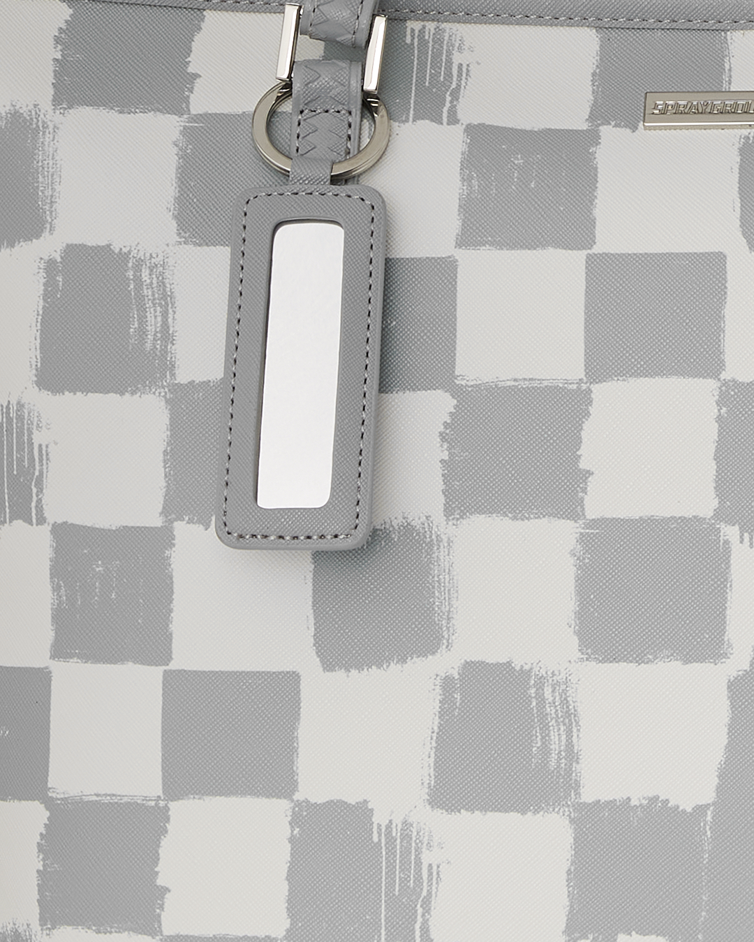 Close-up of metal zipper and key clip on coach teri shoulder bag alternative