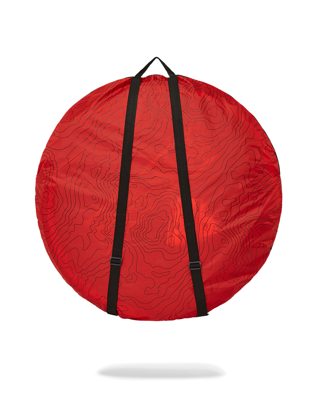 Folded easy setup tent packed in zip carry bag on gravel path