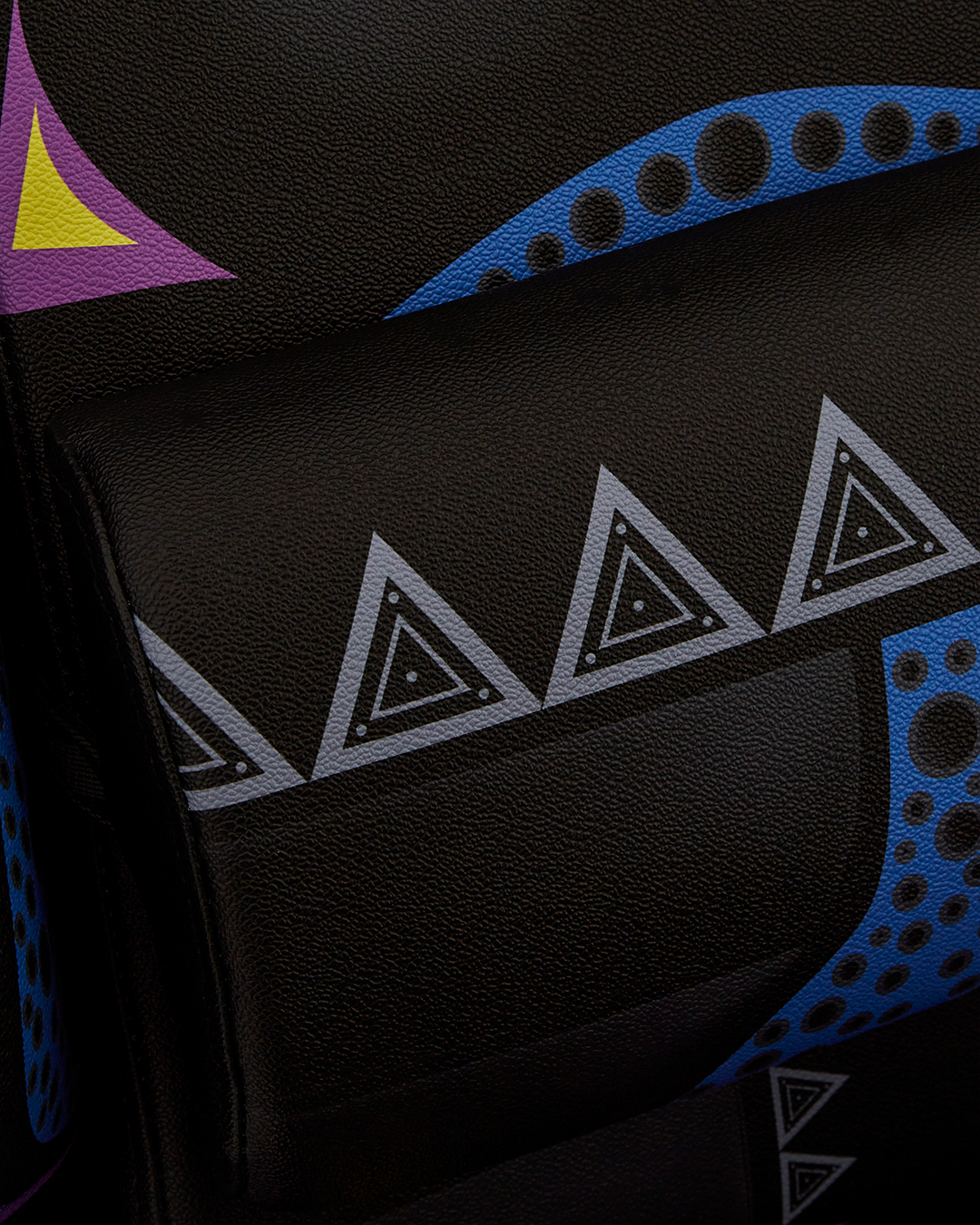 Close-up of the headrest pillow and recline feature of the gaming chair