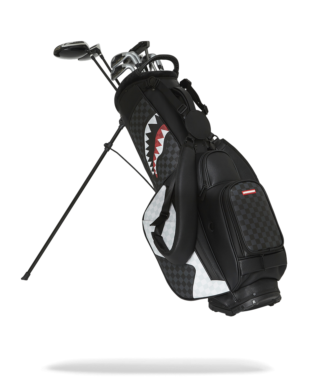 Side view of golf bag featuring towel ring and rain hood