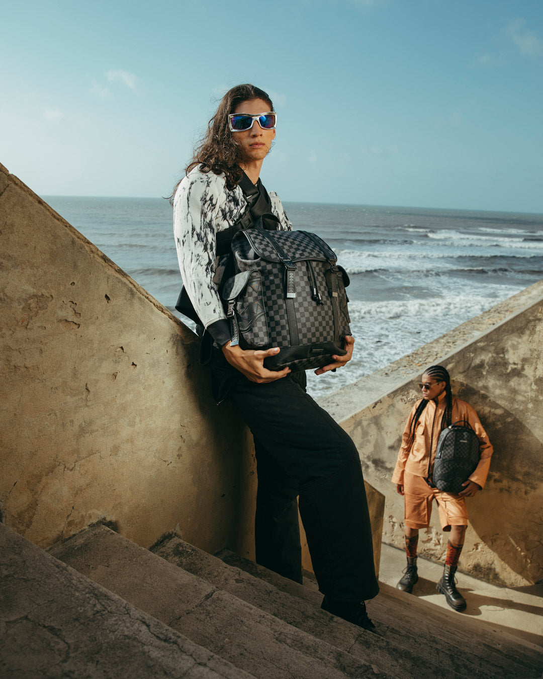 Ergonomic mesh back padding of the mens designer backpack.