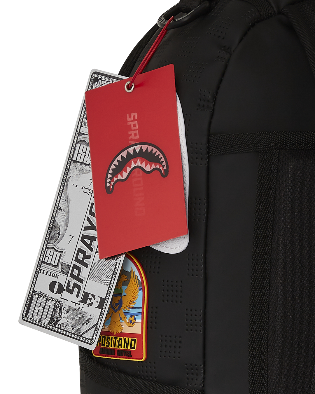 Backpack attached to rolling luggage for travel convenience
