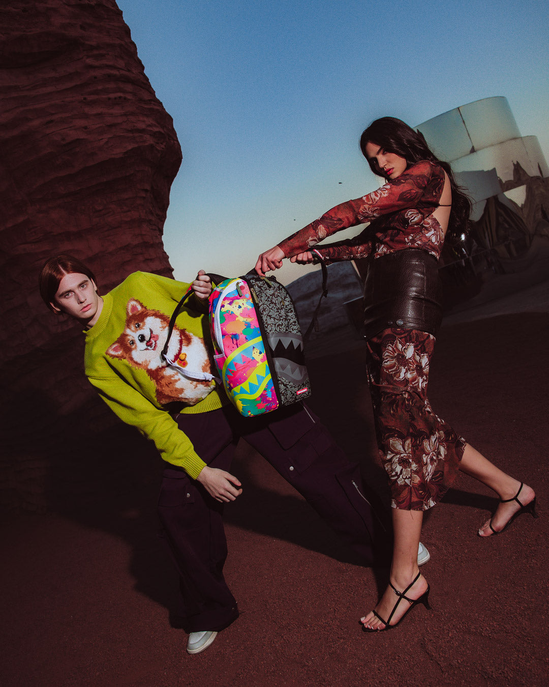 Chaos Twins faux leather backpack worn as one piece, showcasing adjustable straps and front pocket