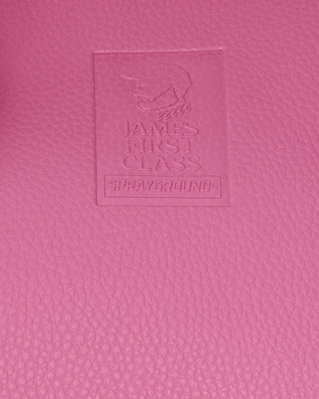 First Class Handbag on display, highlighting enamel details.
