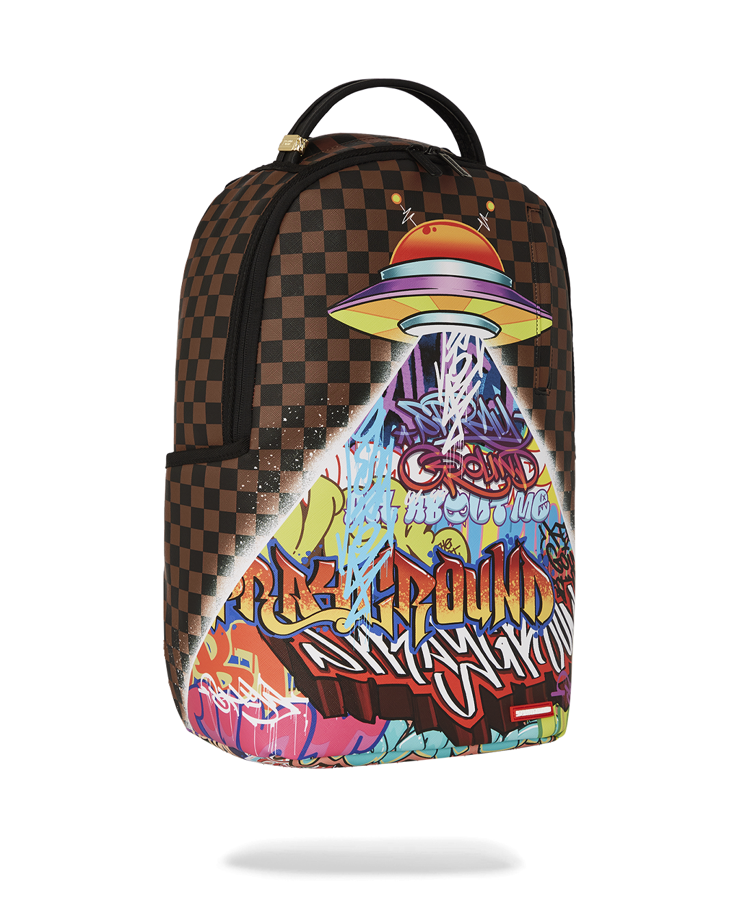 Close-up of gold zippers and sprayground badge on backpack