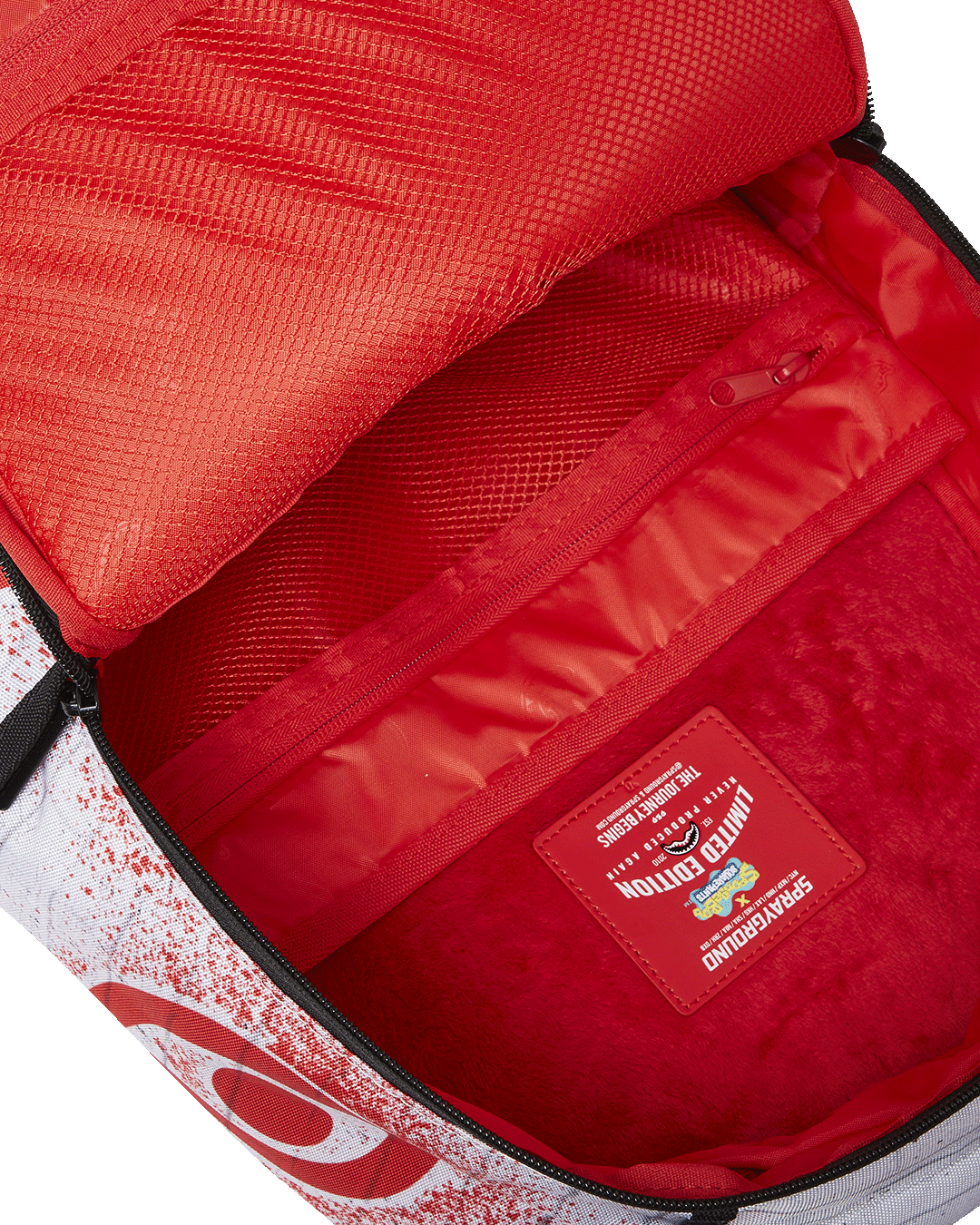 Side profile showing ergonomic mesh straps and utility pockets