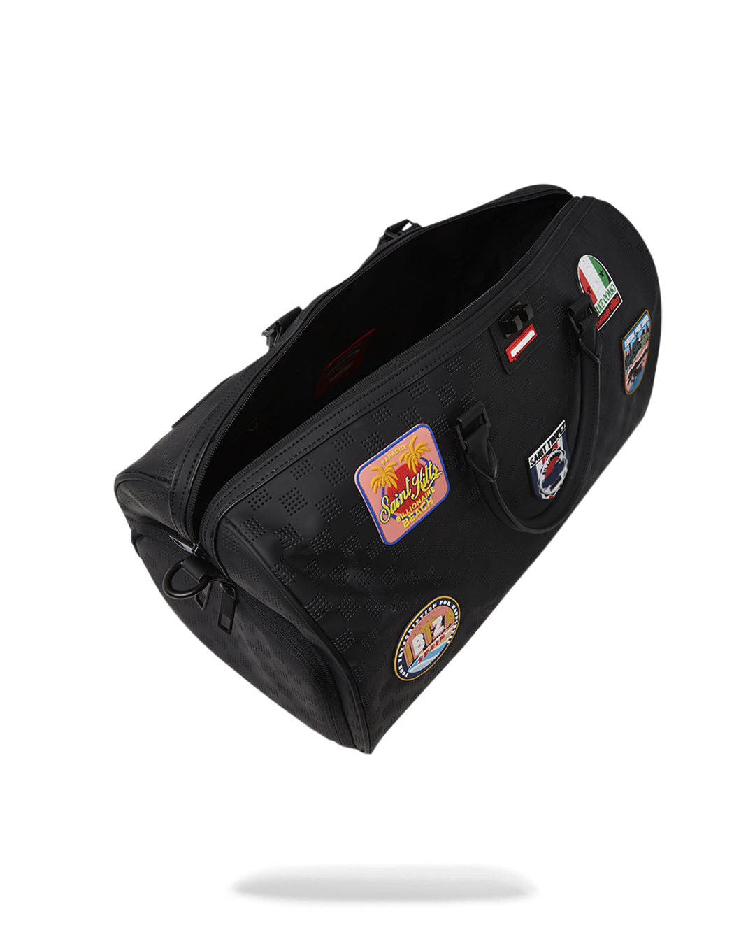 Close-up of the perforated PVC and rubber patches on the travel bag