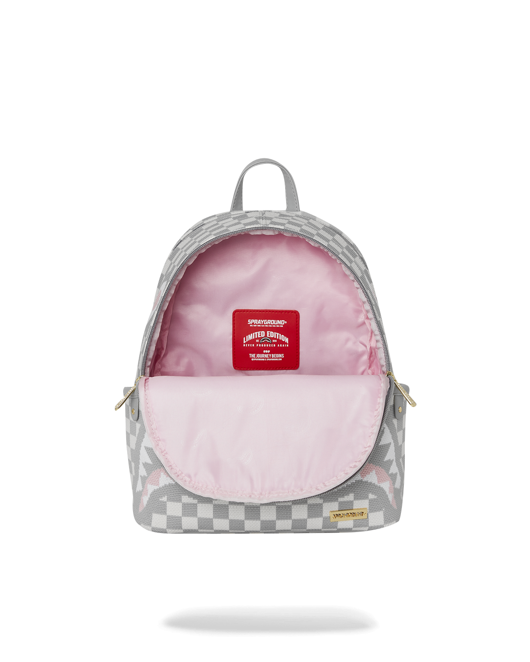 Side angle of the Savage Cream Sharks in Paris Backpack with adjustable straps.
