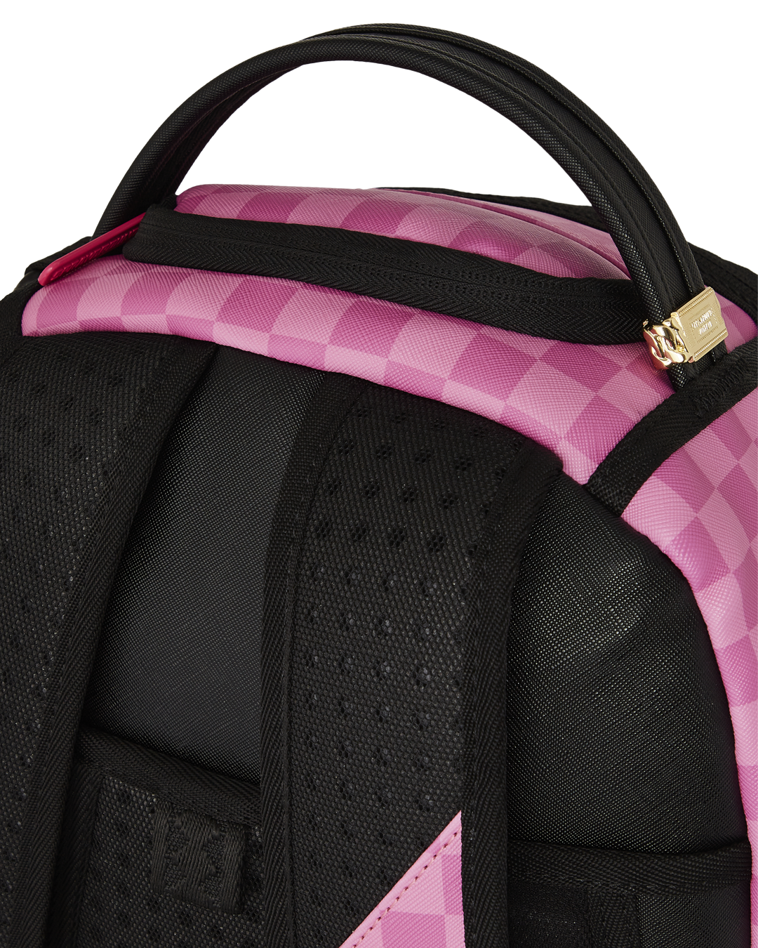 Front angle of Sprayground backpack pink DLXV with Rugrats print and gold zippers.