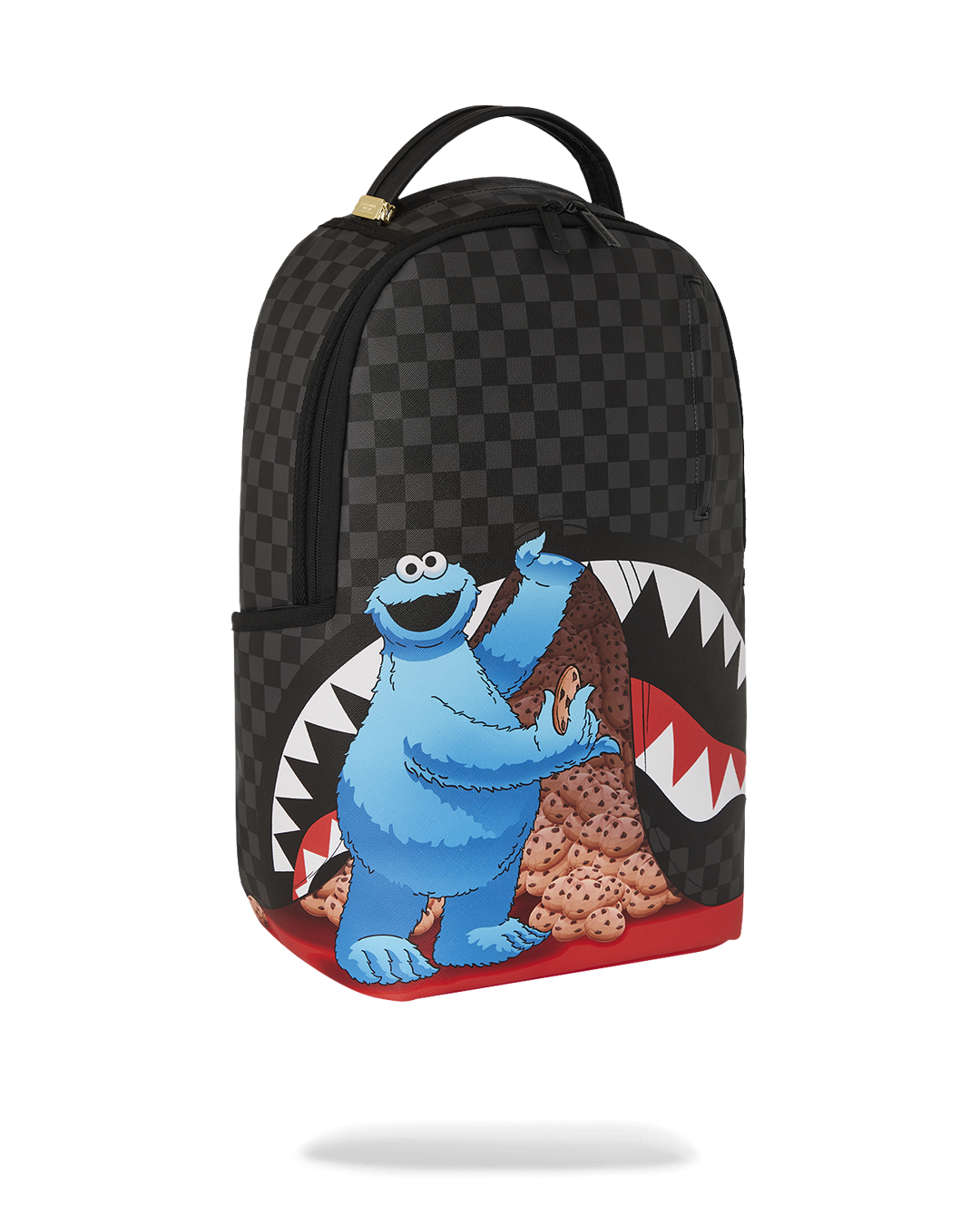 Interior of the Cookie Monster backpack with laptop compartment and mesh organizer.
