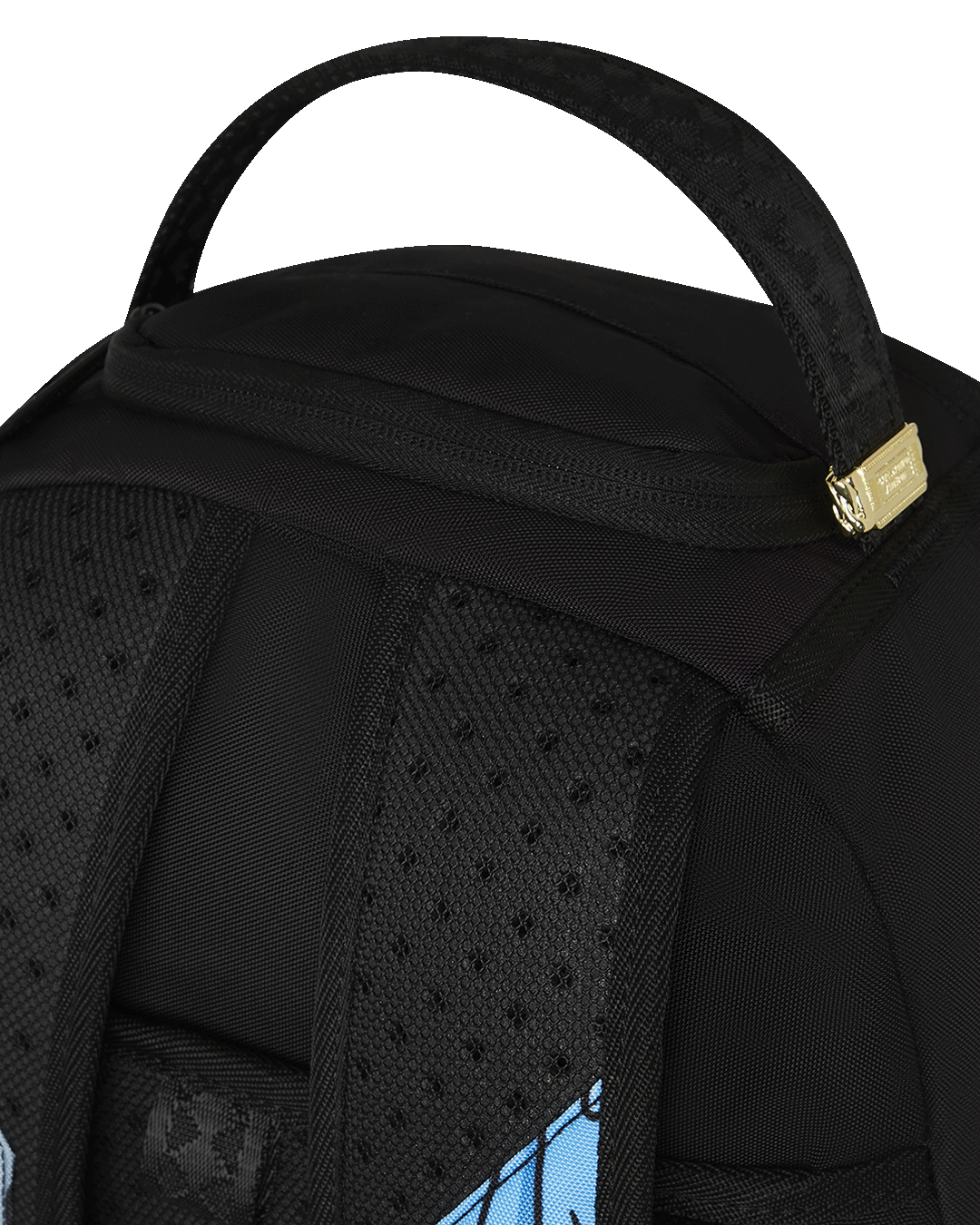 Close-up of the Mega Melt Shark Backpack with bold shark graphic and gold zippers