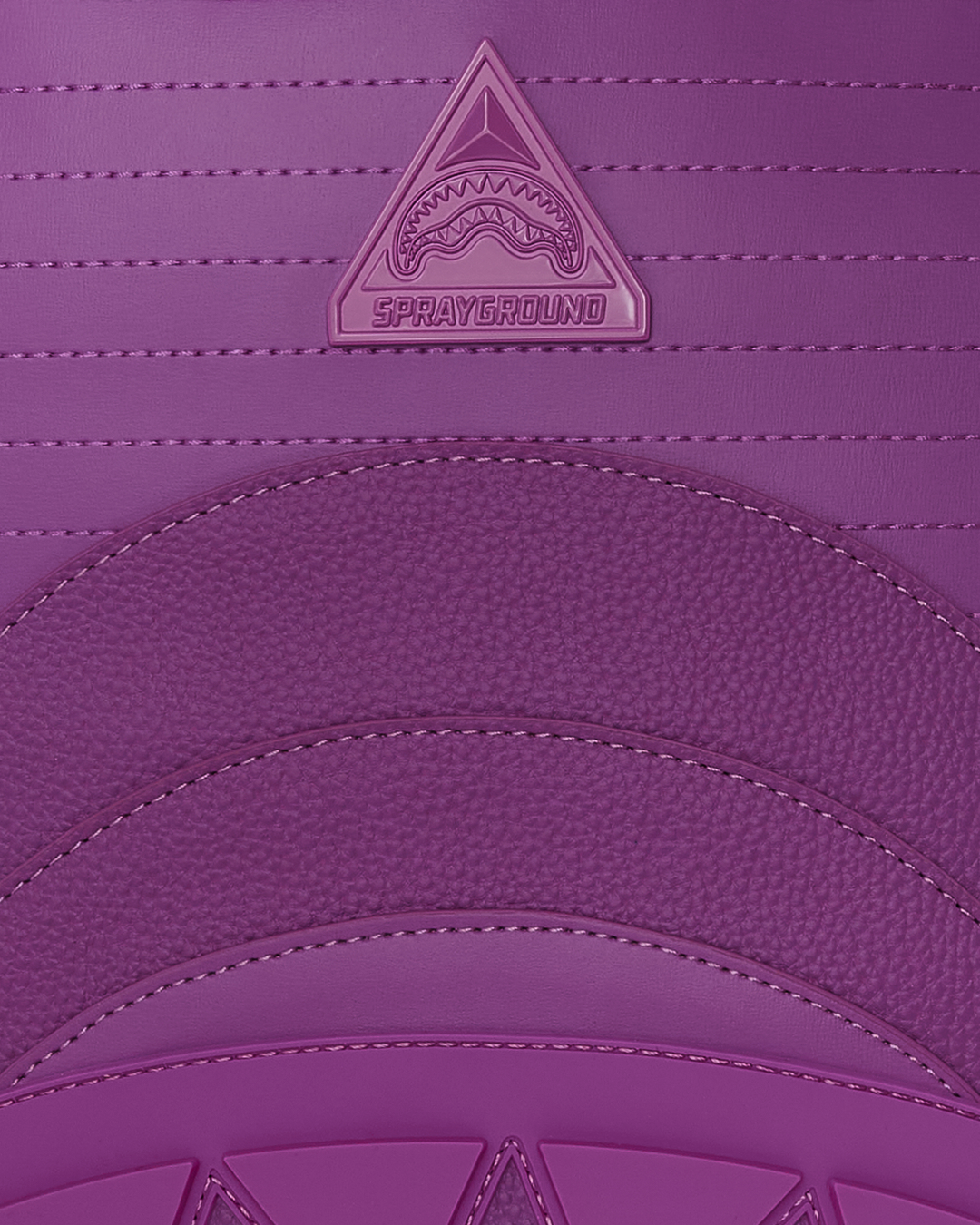 Murasaki faux leather backpack worn casually with a laptop inside