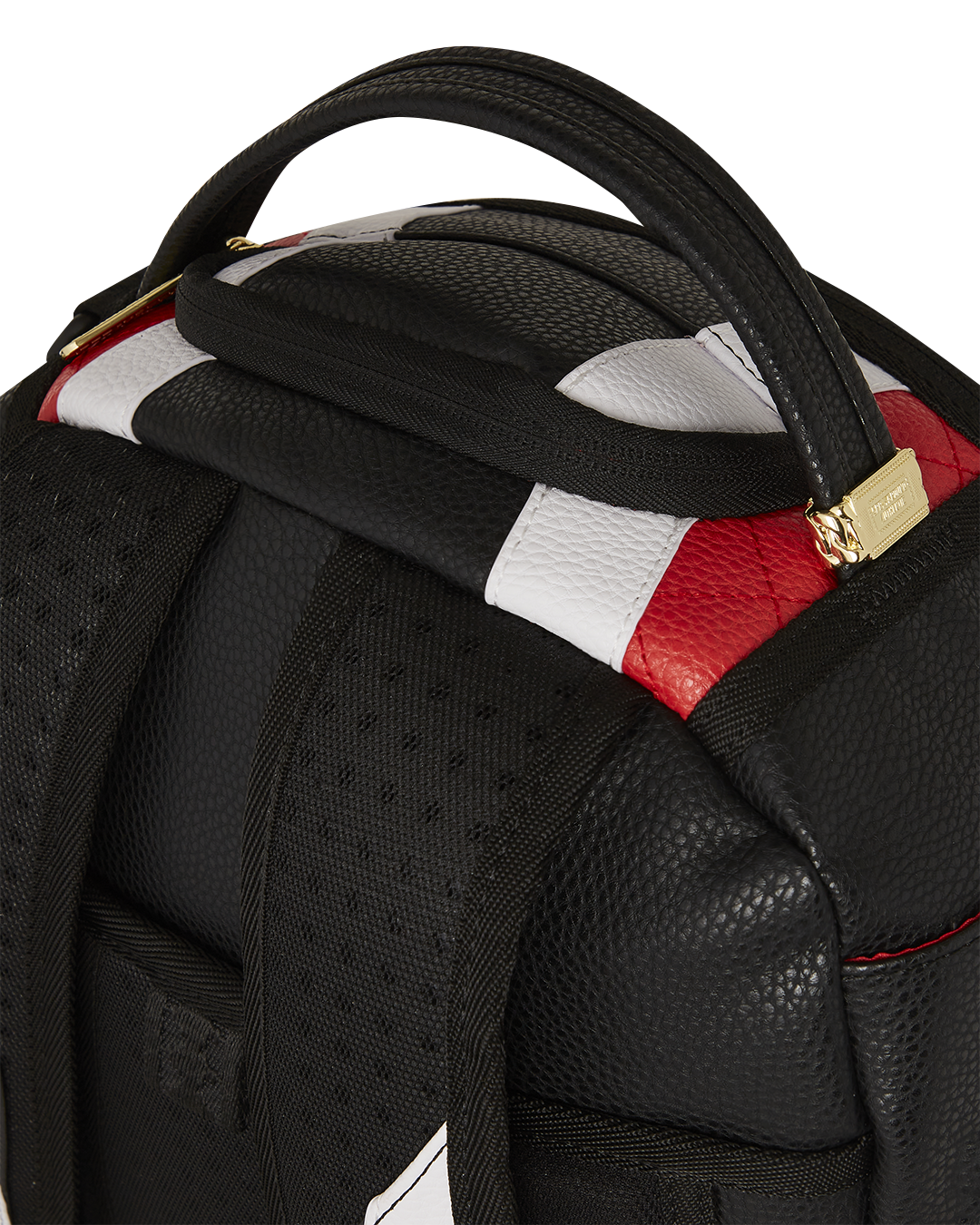 Side view highlighting the backpacks zippered pockets and ergonomic straps.