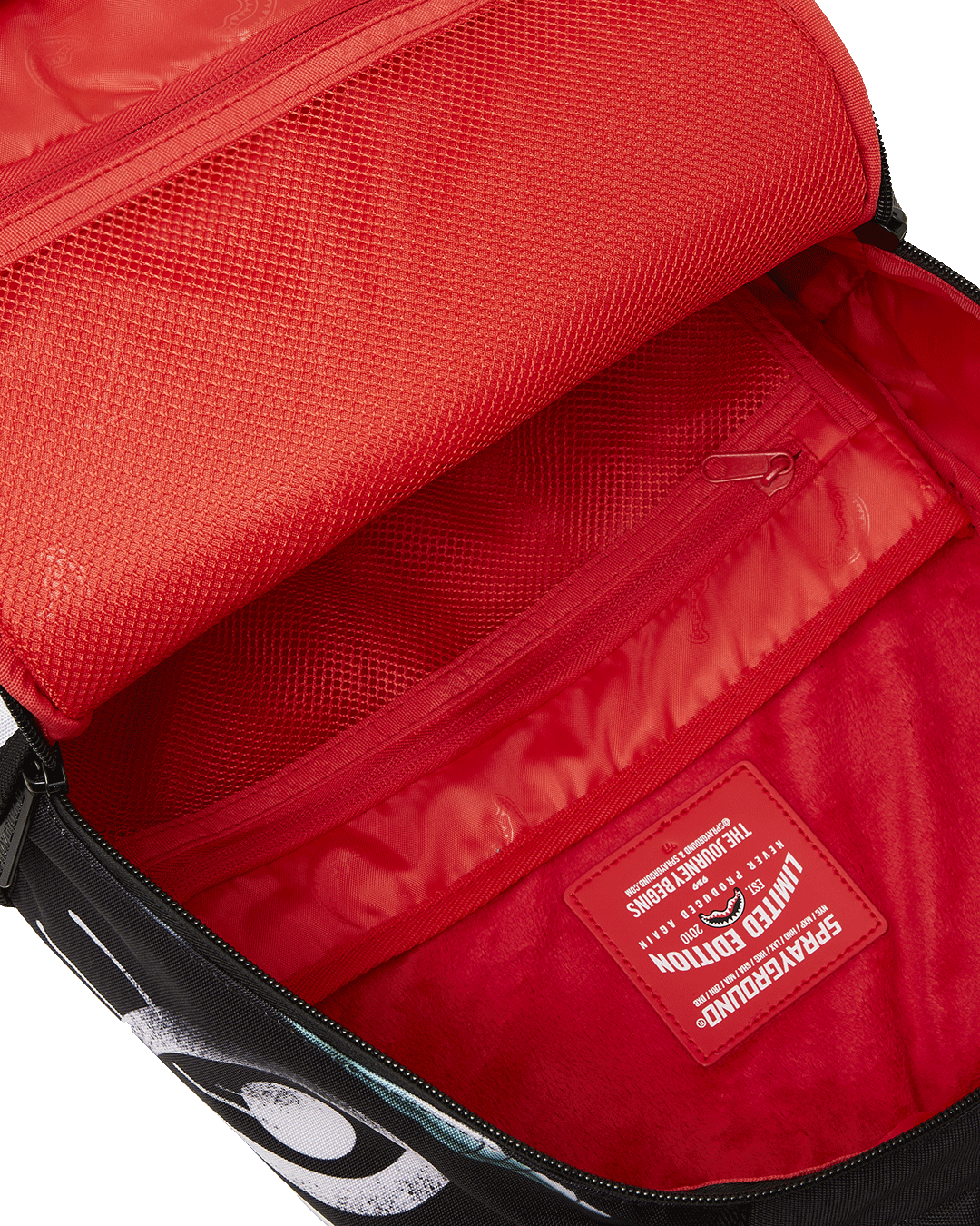 Side angle showing grunge backpacks multiple pockets and adjustable straps