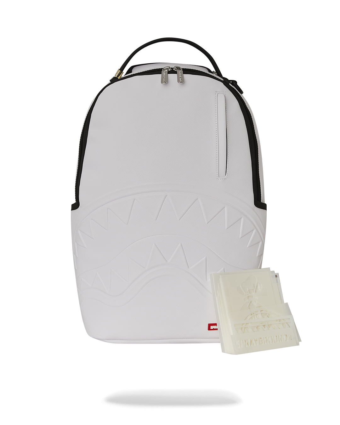 Custom graffiti artist backpack with stencil designs on urban street backdrop