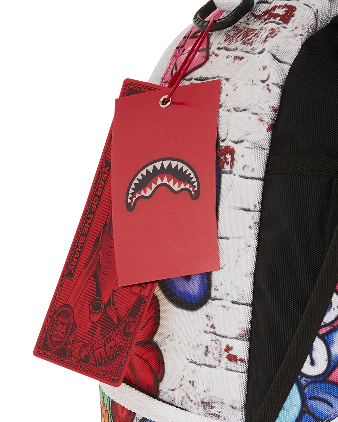 Side pocket detail and padded straps on durable laptop backpack