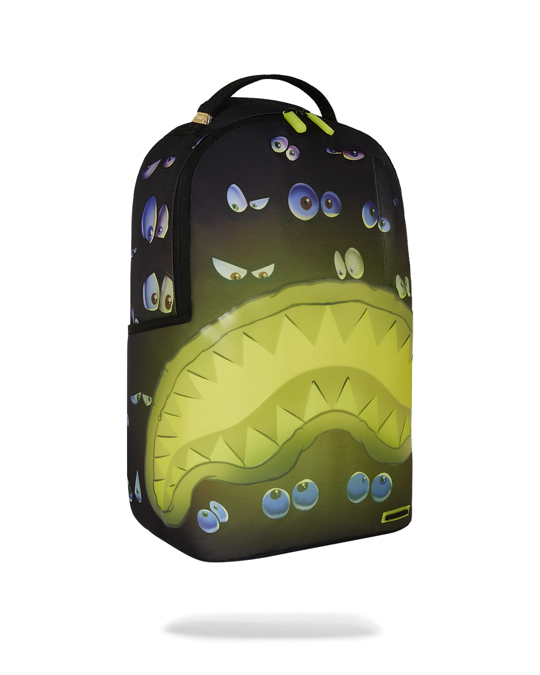 Close-up of gold zippers and Sprayground badge on designer backpack.