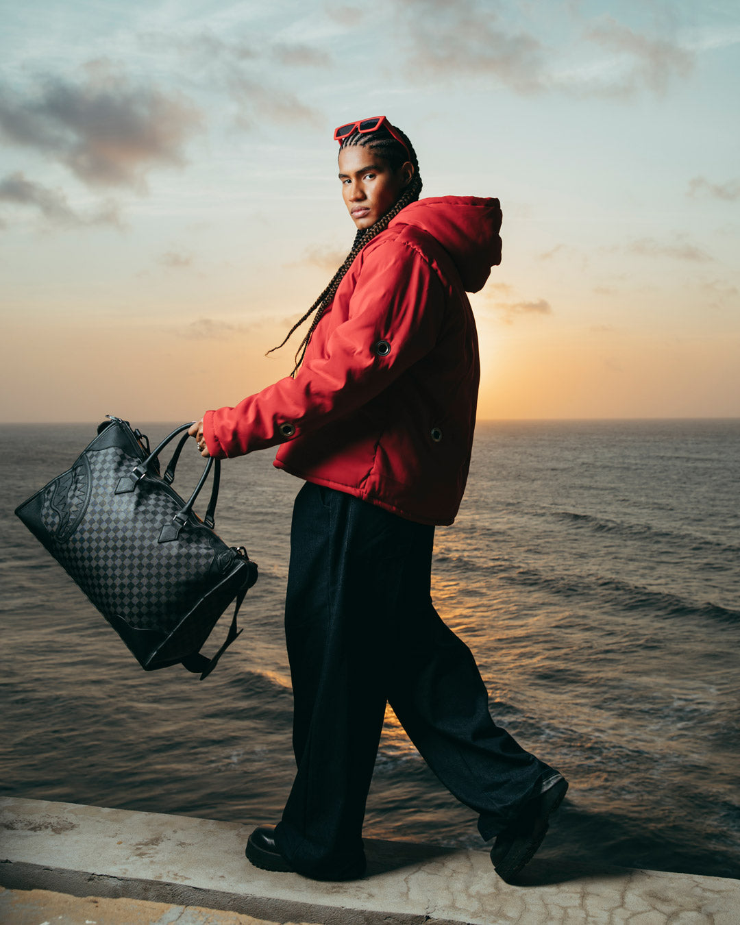 Midnight Château Faux Leather Duffle Bag being used as a golf travel bag