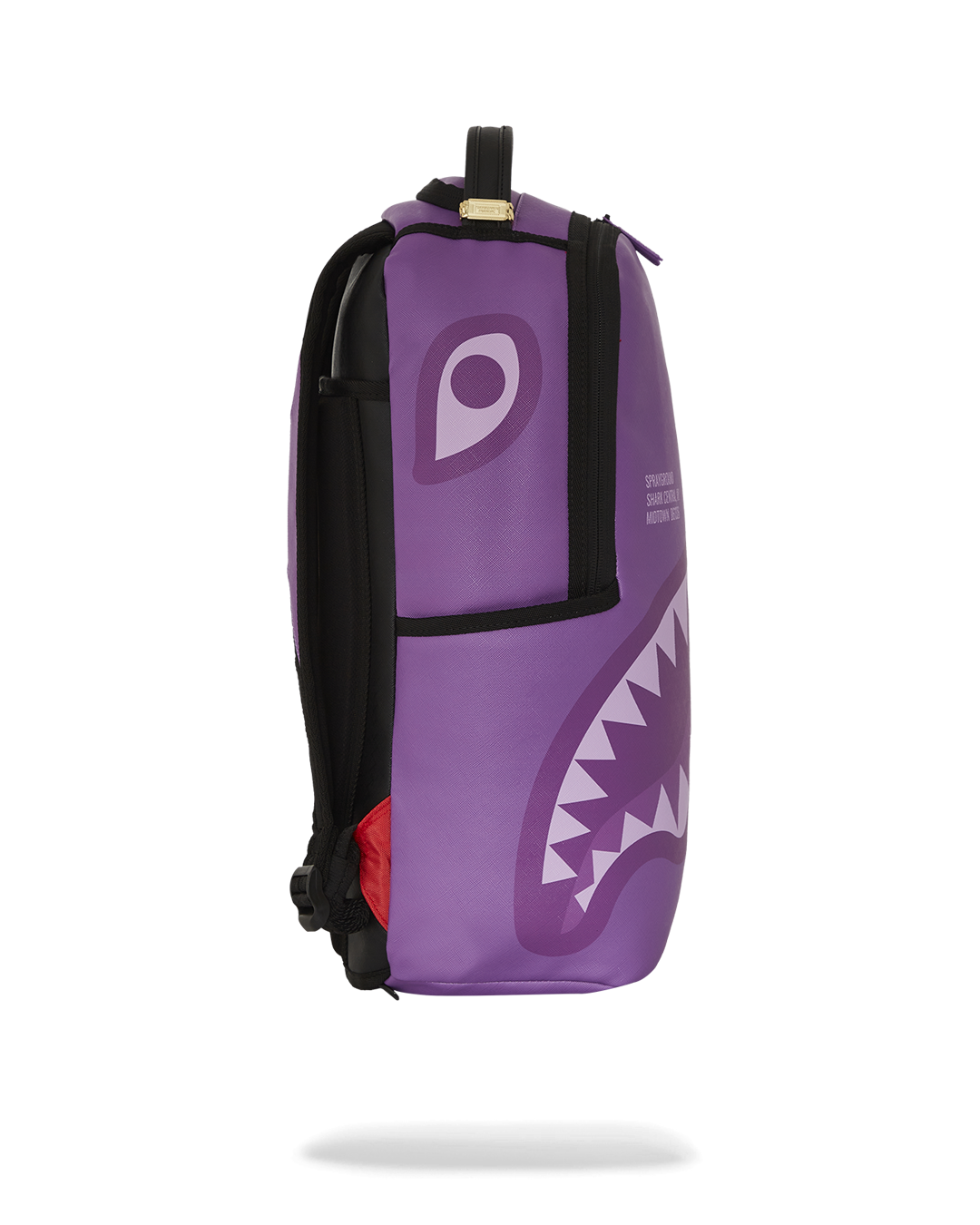 Side view of the fashion backpack highlighting gold metal zippers and adjustable straps.