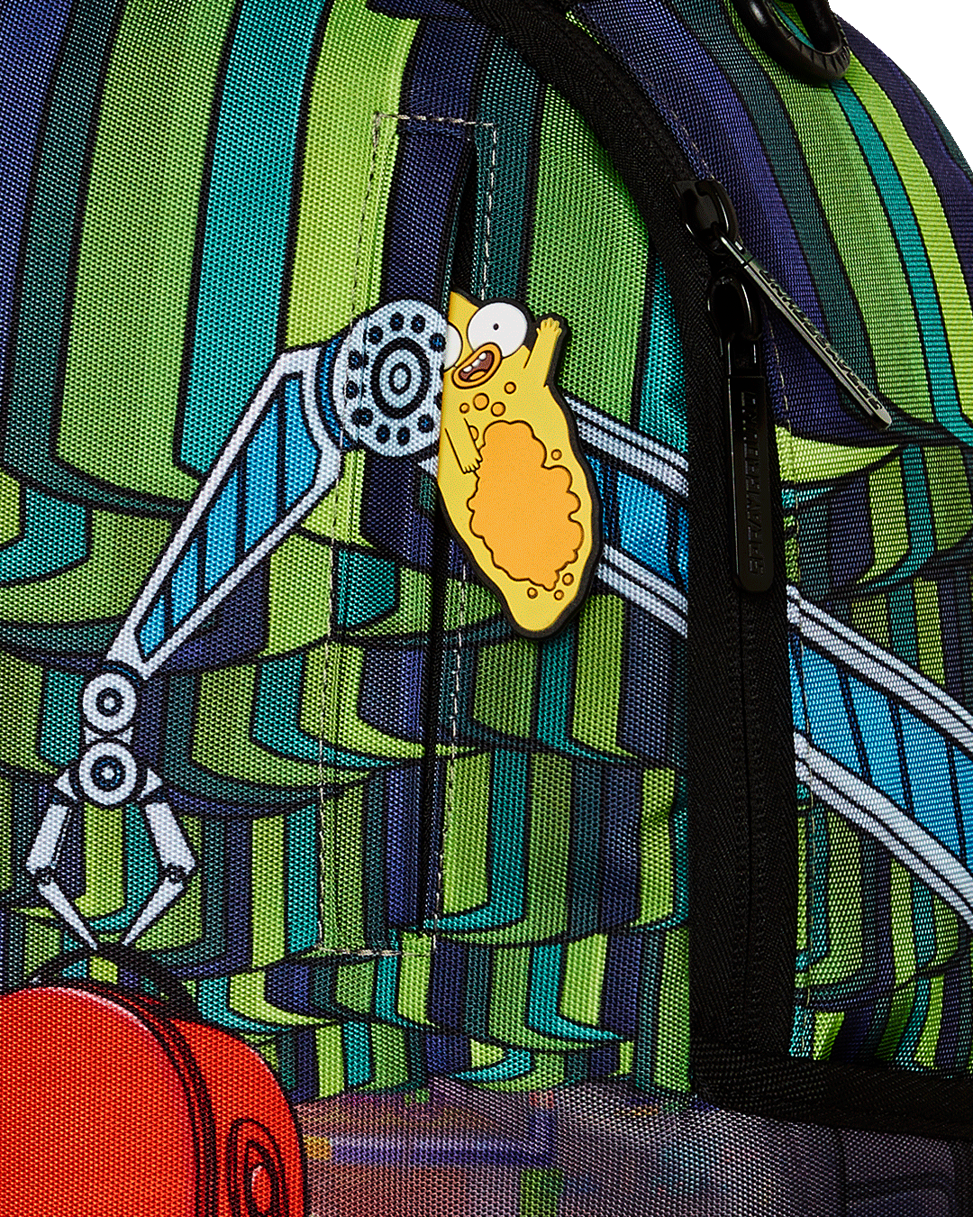 Close-up of the pink Sprayground backpack, emphasizing the velour sunglass compartment.