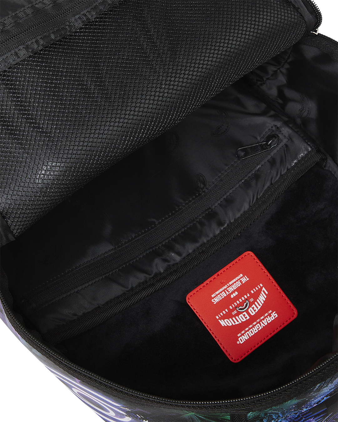 Interior view of the faux leather travel backpack with laptop compartment.
