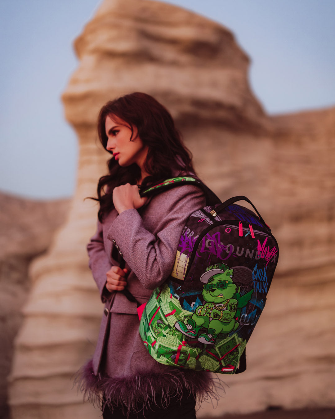 Side view of the backpack with side pockets and adjustable straps