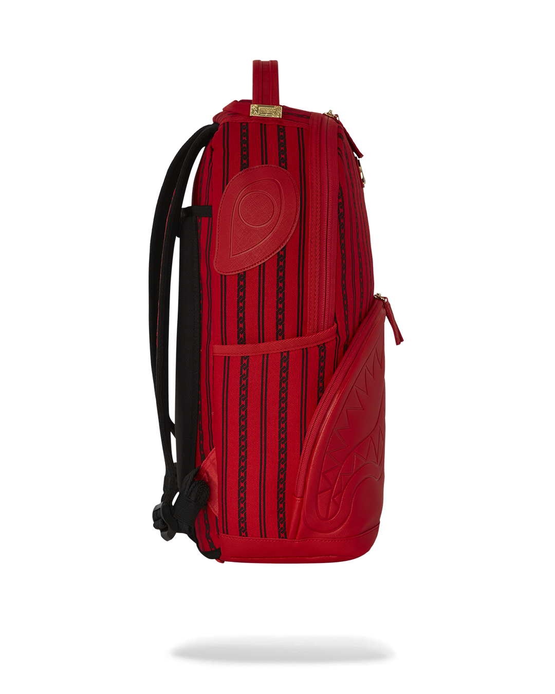 Close-up of the backpacks interior showing the velour laptop compartment and mesh organizer pocket