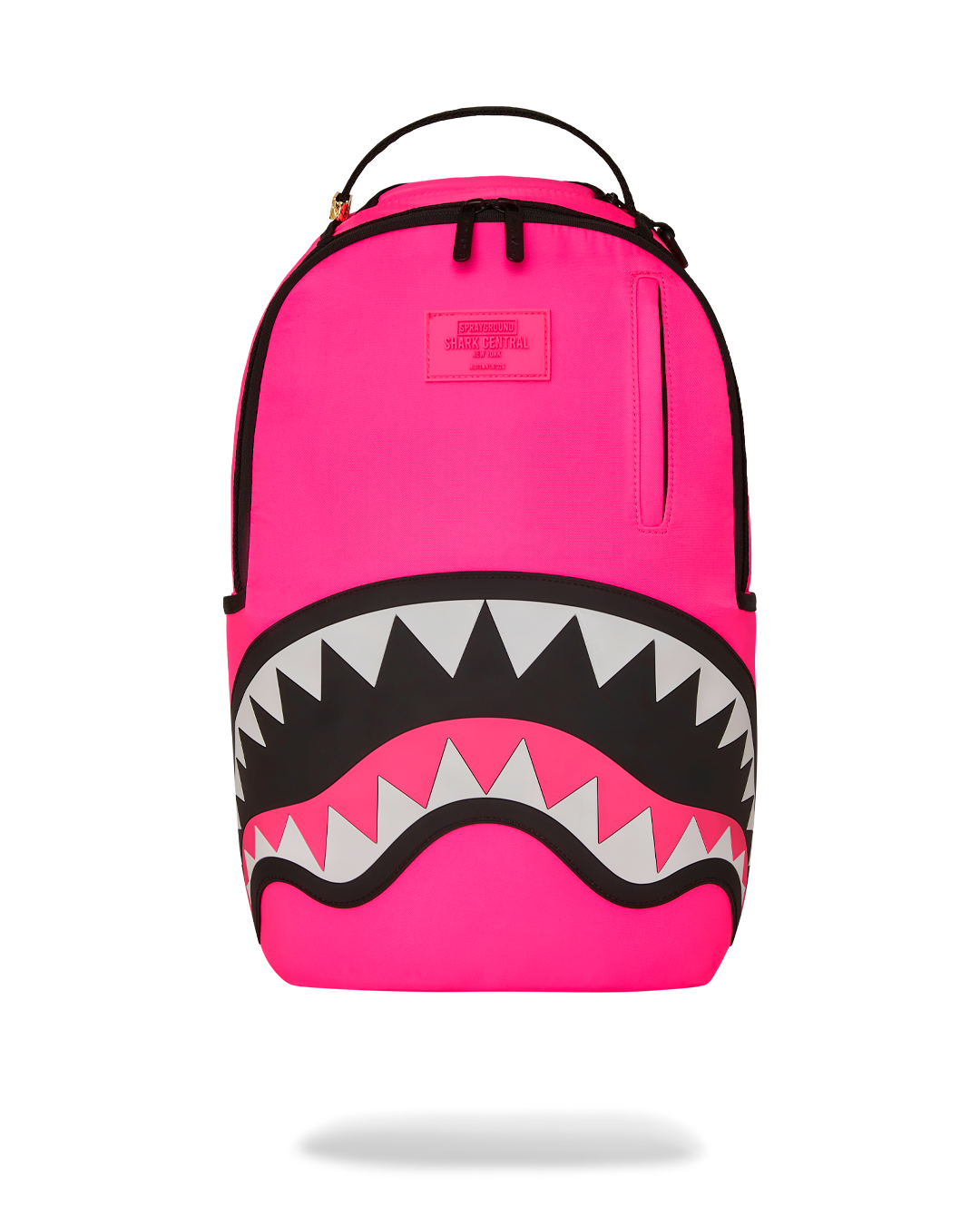 Front angle view showing backpack's gold zipper and rubber detailing